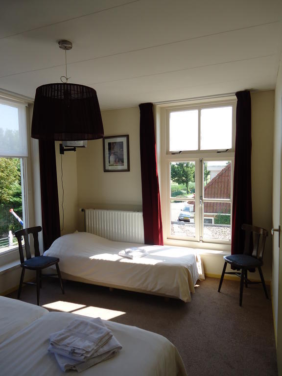Hotel "De Steenen Man" Zurich Pokoj fotografie